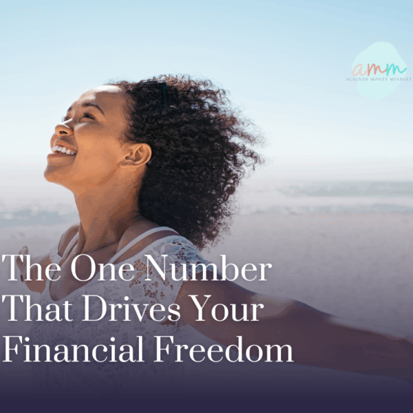 Woman of color standing with open arms on the beach, symbolizing financial freedom, clarity, and the space created by understanding your financial gap.