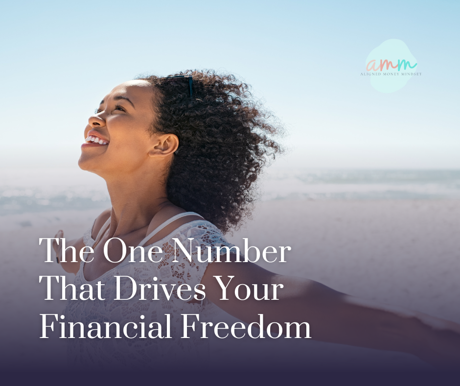 Woman of color standing with open arms on the beach, symbolizing financial freedom, clarity, and the space created by understanding your financial gap.