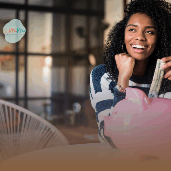 Woman placing money into a piggy bank to illustrate how sinking funds help you save ahead and avoid debt.